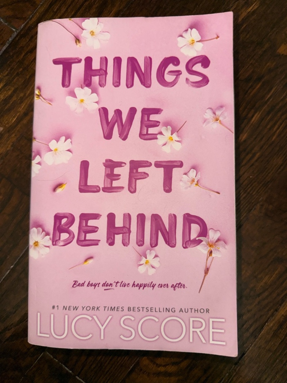Things We Left Behind by Lucy Score - Pink Floral Paperback